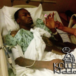 Louisville Cardinal’s Guard Kevin Ware Holds Regional NCAA Trophy In Hospital Bed Following Surgery
