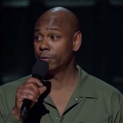 Dave Chappelle Attacked By Man Armed With Gun and Knife During Comedy Show. After Attack, Chappelle Joked: “It Was a Trans Man.”
